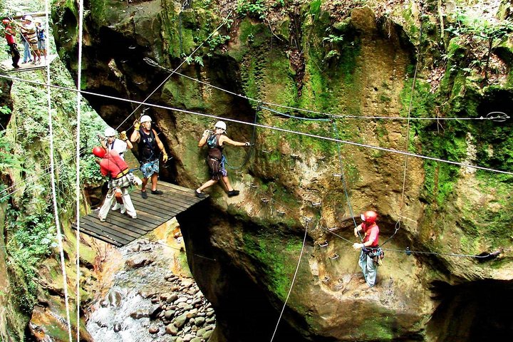 Guachipelin Volcano Combo: Zipline, River Tubing & Hot Springs