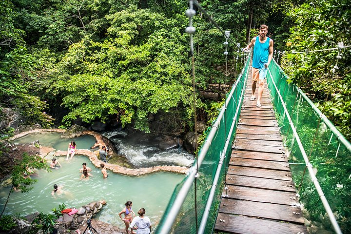 Guachipelin Volcano Combo: Zipline, River Tubing & Hot Springs