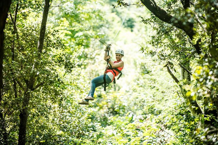 Guachipelin Volcano Combo: Zipline, River Tubing & Hot Springs