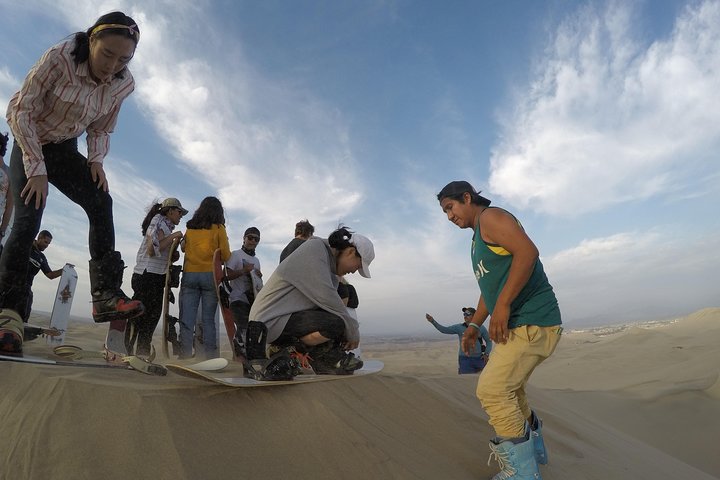 Sandboard o sci di sabbia a Huacachina Falò di Apresski Tramonto