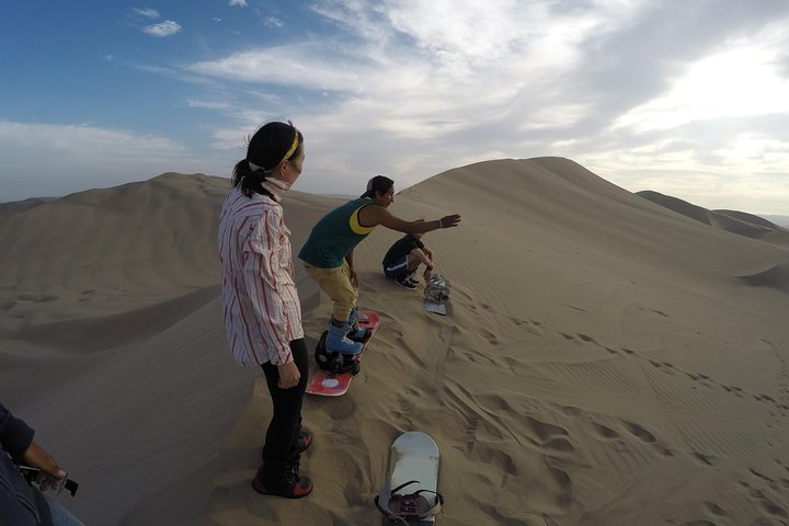 Sandboard o sci di sabbia a Huacachina Falò di Apresski Tramonto