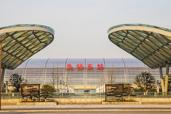 Traslado privado de llegada desde la estación de tren de Wuxi al hotel de la ciudad