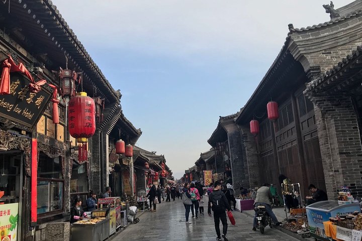 Excursión privada de un día al compuesto familiar Qiao y al casco antiguo de Pingyao desde Taiyuan