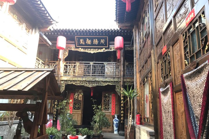 Excursión privada de un día al compuesto familiar Qiao y al casco antiguo de Pingyao desde Taiyuan