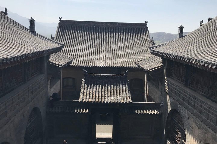 Excursión privada de un día al compuesto familiar Qiao y al casco antiguo de Pingyao desde Taiyuan