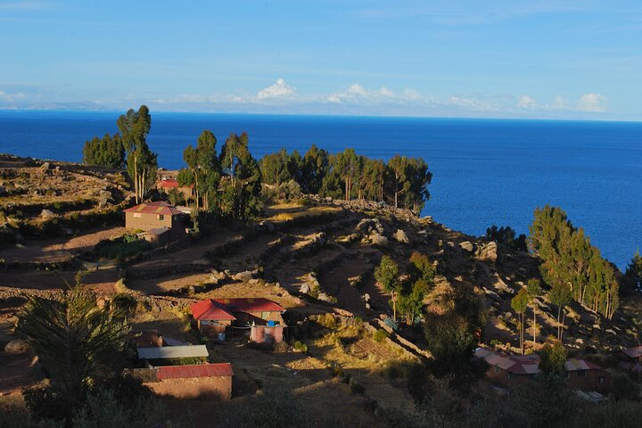 Uros Schilf schwimmende Inseln & Taquile Insel Titicaca Puno Ganztags