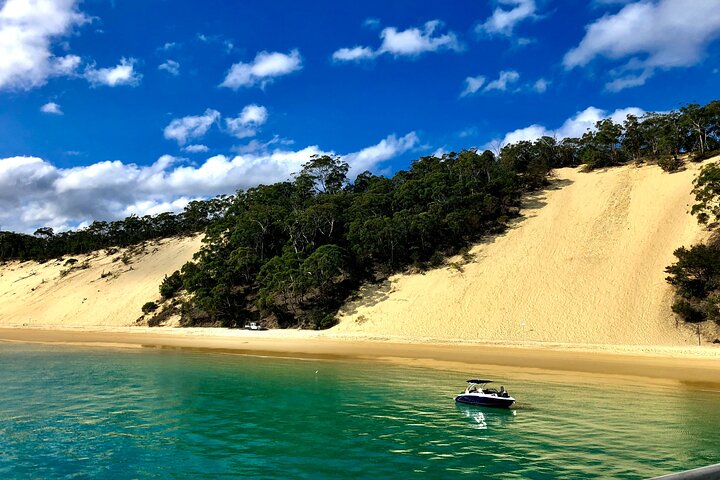 Viagem diurna à Ilha Moreton (caiaque, snorkel e sandboard) de Brisbane ou Gold Coast