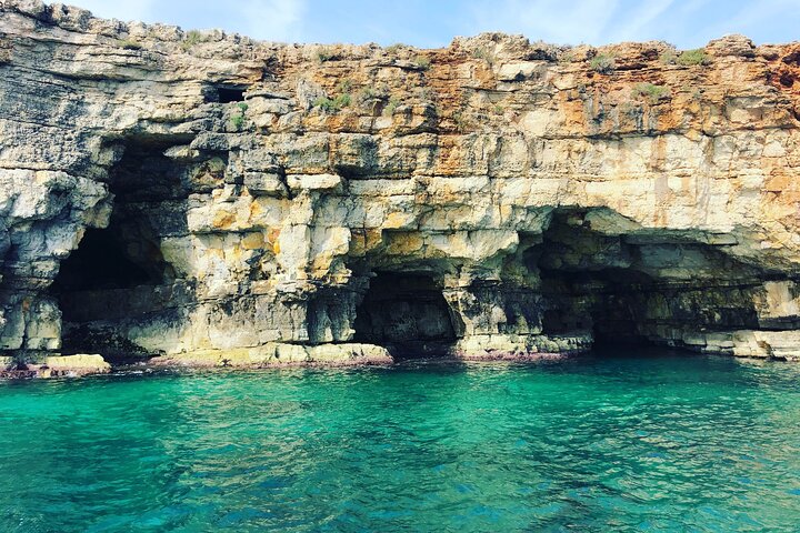 Polignano a Mare båttur følelser, grotter, dykking og forretter