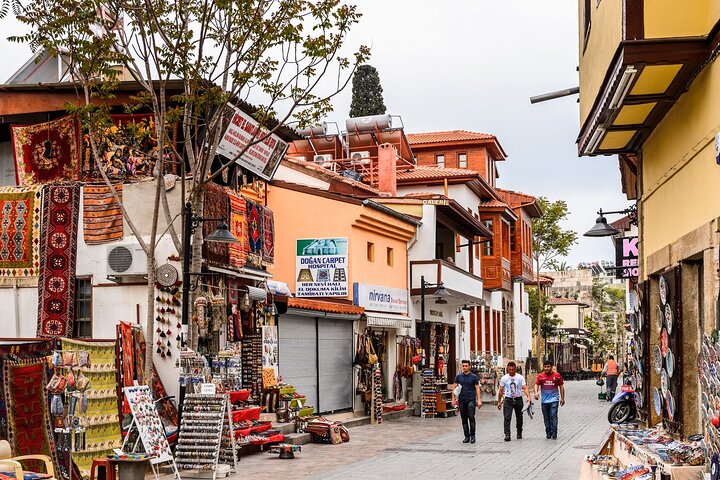 Antalya: Autobús panorámico con excursión en barco de 1 hora incl. Almuerzo