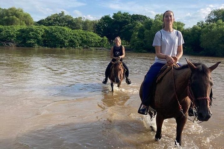 Tour a cavallo al tramonto autentico a Puerto Escondido