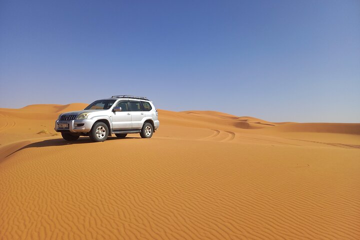 Resa från Erfoud till Merzougaöknen, middag, kamelritt, solnedgång