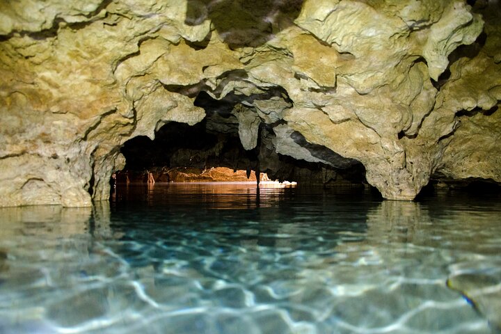 Paardrijavontuur van een halve dag met cenotes in de jungle