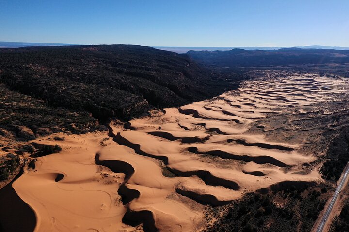 Koraalroze zandduinen UTV Sandboarden en Slot Canyon