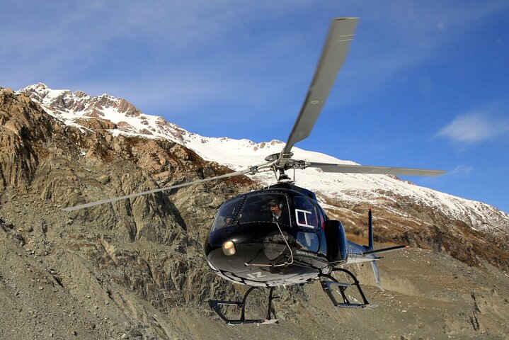 25-minuters helikopterflyg inklusive en alpin landning