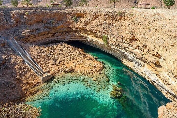 Full Day Group Tour to Wadi Shab Bimmah Sinkhole and Fins Beach