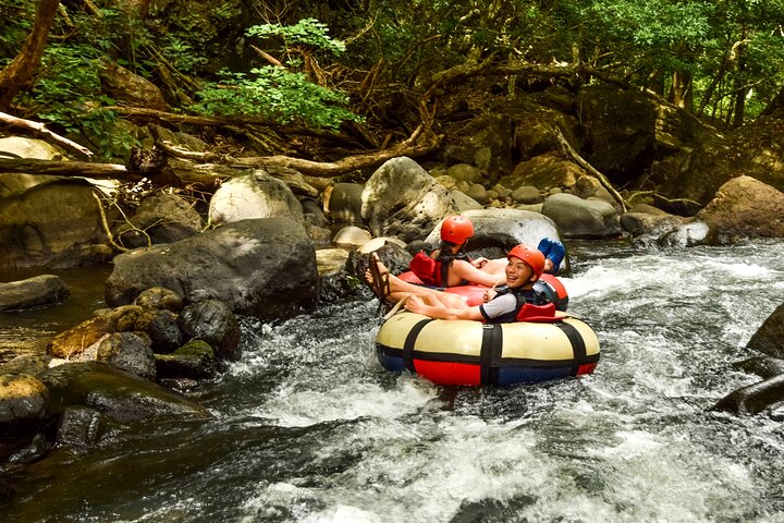 Guachipelin Volcano Combo: Zipline, River Tubing & Hot Springs