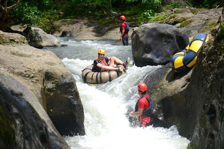 Guachipelin Volcano Combo: Zipline, River Tubing & Hot Springs