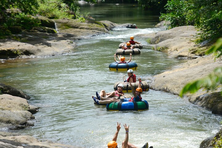 Guachipelin Volcano Combo: Zipline, River Tubing & Hot Springs