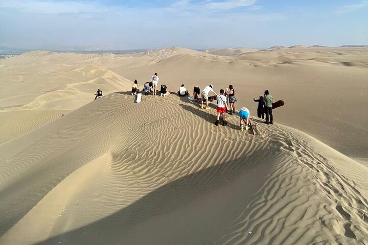 Sandboard o sci di sabbia a Huacachina Falò di Apresski Tramonto