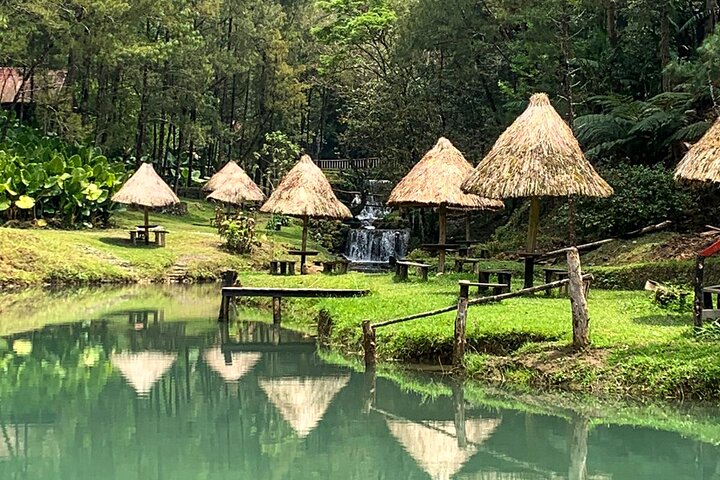 Tour di un'intera giornata alle grotte e alla natura di Rey Marcos da Coban