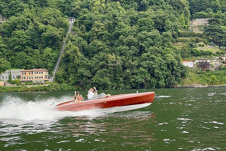 Private Comer See-Tour auf einem klassischen Holzboot