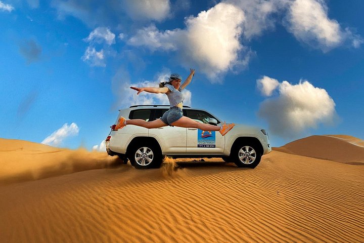 Dubai 4-timmars safari i röda öknen, kamelridning, sandboarding och falk