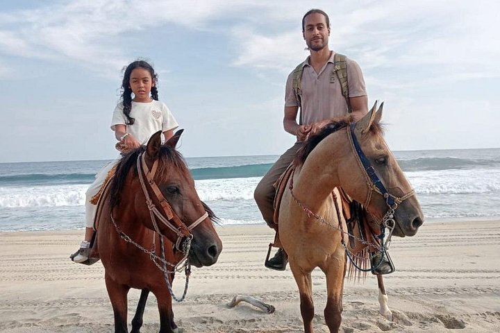 Tour a cavallo al tramonto autentico a Puerto Escondido