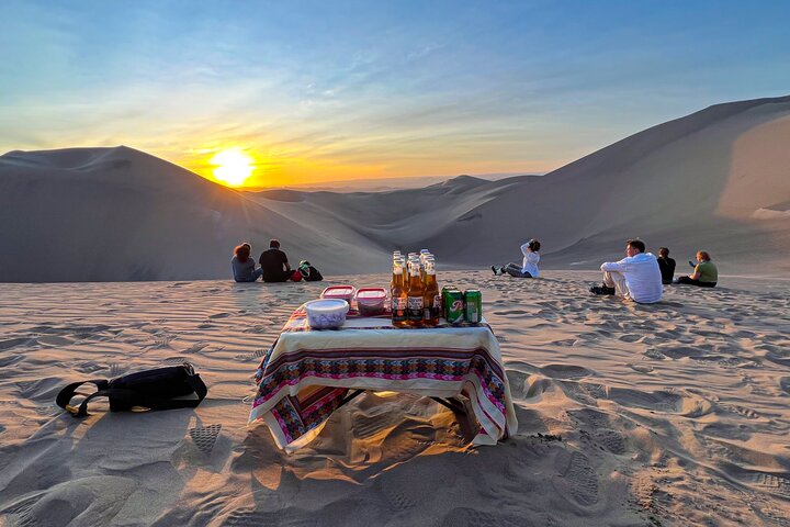 De ultieme sandboard- en sandski-ervaring, zonsondergang, buggy en kampvuur!