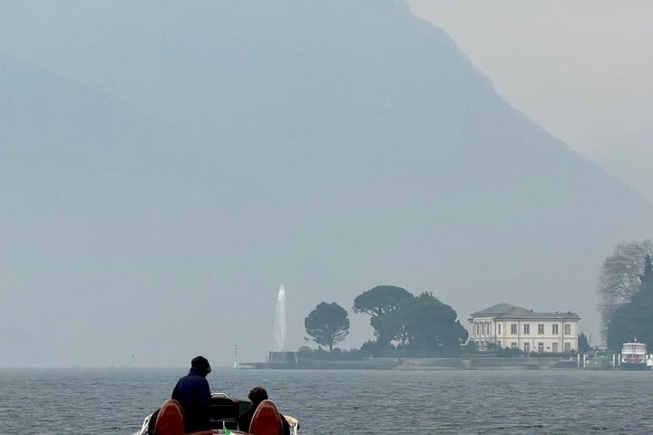 Private Comer See-Tour auf einem klassischen Holzboot
