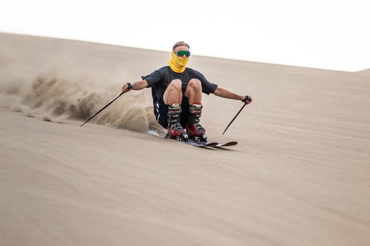 Sandboard o sci di sabbia a Huacachina Falò di Apresski Tramonto