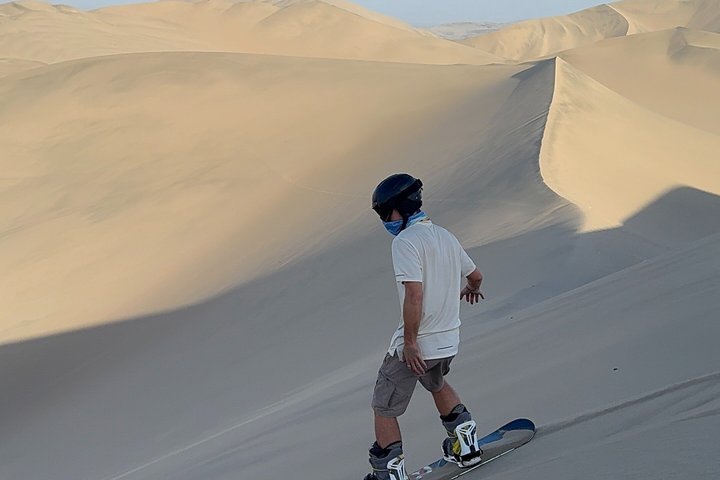 Sandboard o sci di sabbia a Huacachina Falò di Apresski Tramonto
