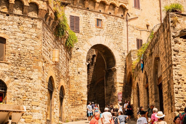 Pisa, Siena, San Gimignano met lunch en wijnproeverij bij een wijnmakerij